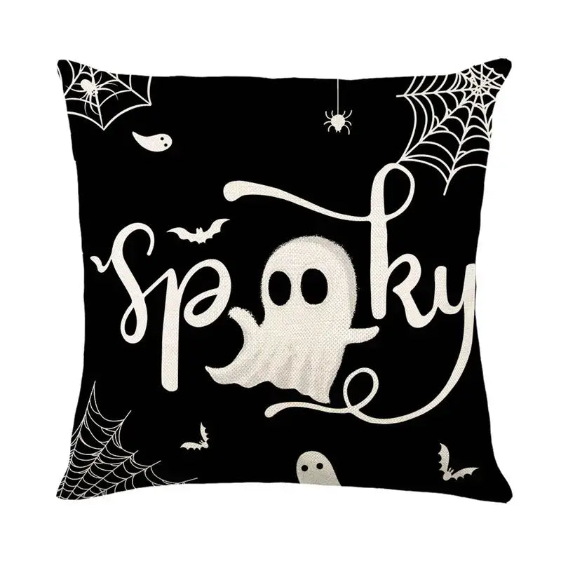 Black halloween pumpkin linen cushion cover with white ghost bats spiderwebs and spooky lettering for sofa