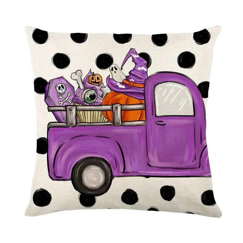 Purple halloween-themed truck pillow with black polka dots in a spooky halloween pumpkin linen cushion cover set