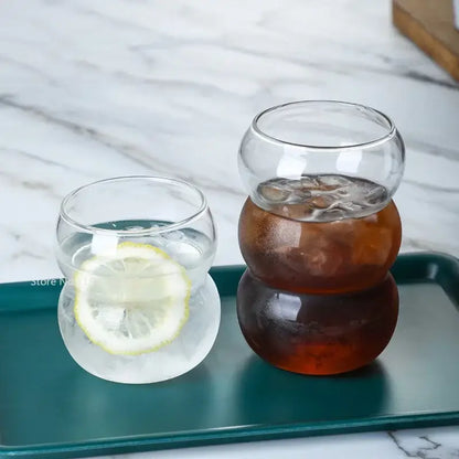 Clear glass cold brew coffee tumblers with stacked rounded design and textured surfaces for brew coffee cup use