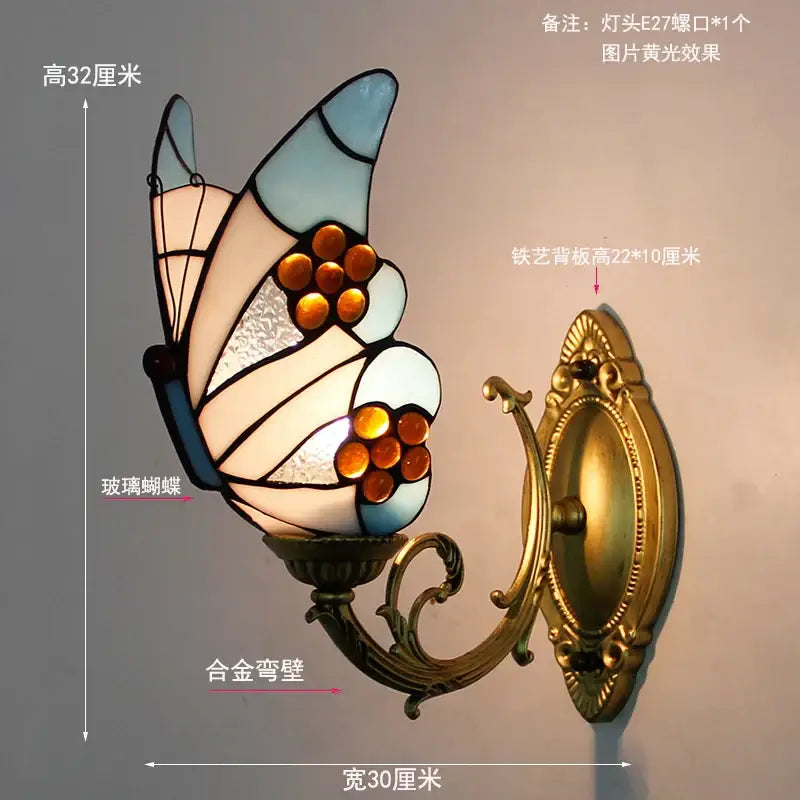 Decorbites butterfly stained wall sconce with blue white amber stained glass wings and gold metalwork for living room decor