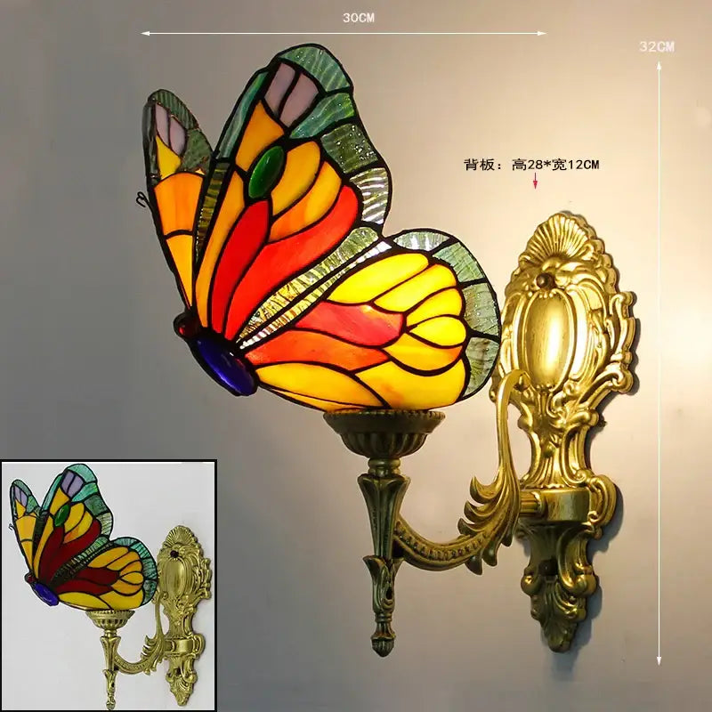 Vibrant stained glass butterfly wall sconce with gold metalwork for living room decor by decorbites butterfly stained wall sconces