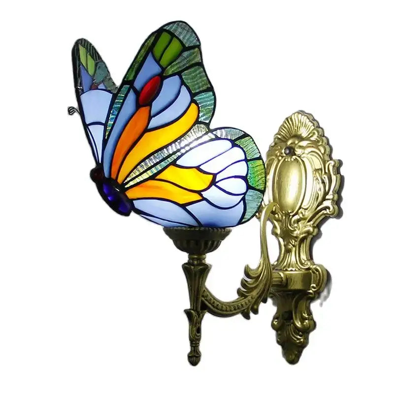 A vibrant stained glass butterfly wall sconce with intricate gold metalwork for living room decorbites butterfly stained style