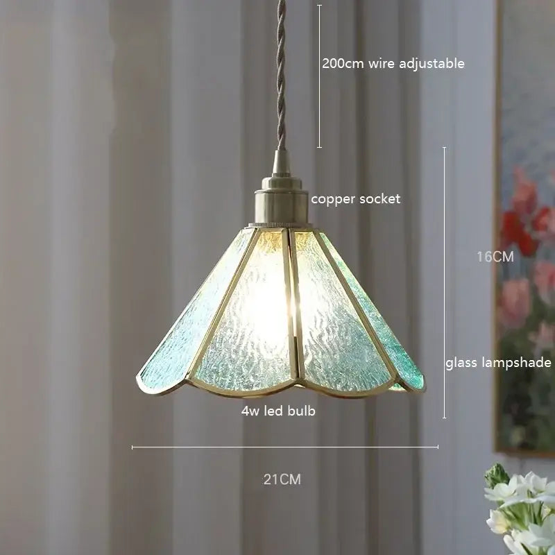 Stained glass floral pendant light with teal tinted hammered glass and gold trim hanging from copper socket decorbites colorful glass copper