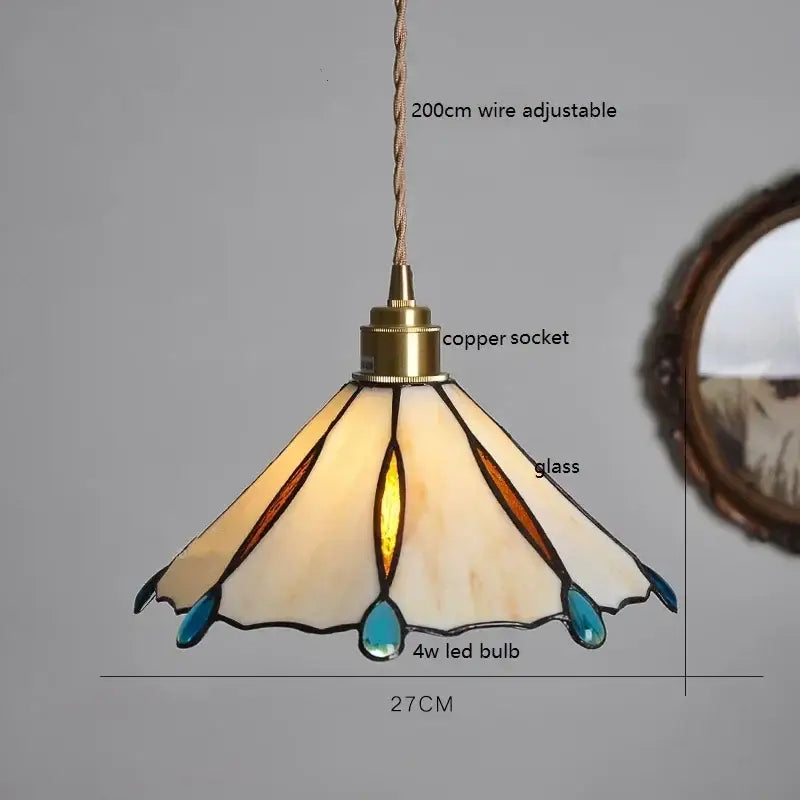 Stained glass pendant light with cream amber panels and teal accents featuring a colorful glass copper socket for kitchen decorbites colorful glass copper finish
