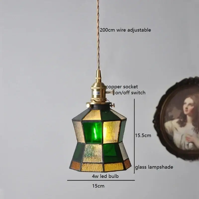 Vintage-style stained glass pendant light with geometric green yellow amber panels and colorful glass copper finish decorbites design