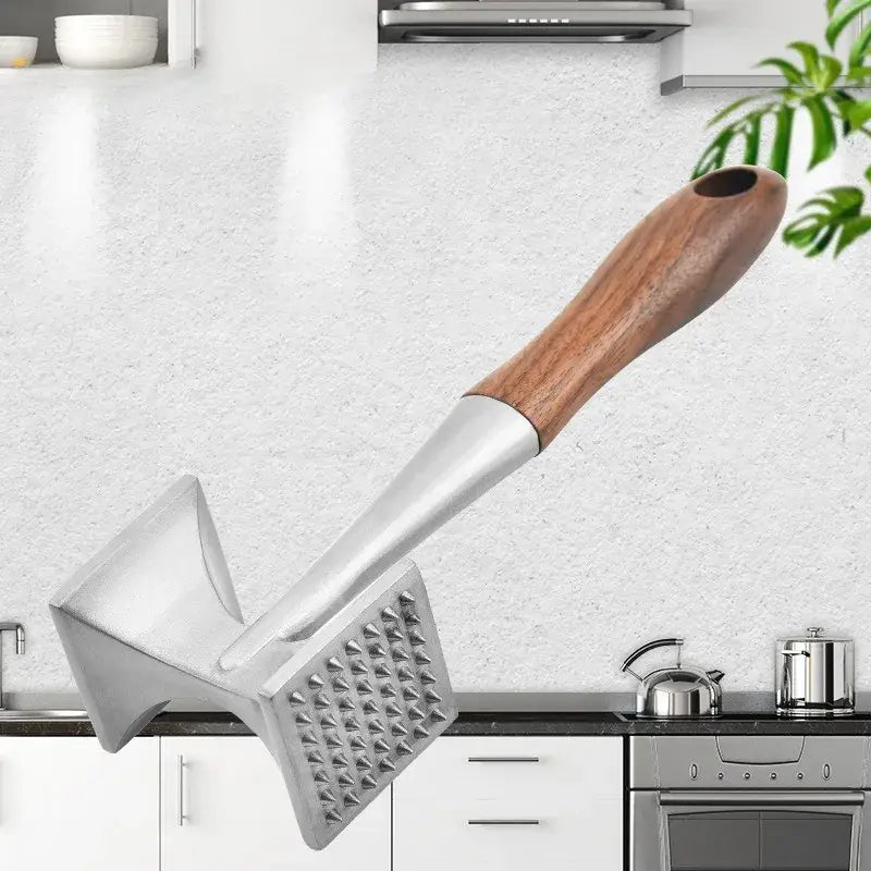 Silver stainless steel double faced meat tenderizer with smooth light brown wooden handle for kitchen use