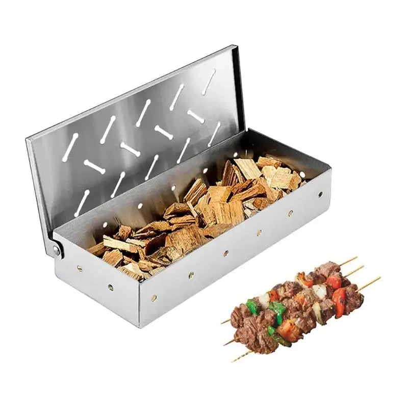 Stainless steel rectangular bbq smoker box with hinged lid and diagonal slits filled with light hardwood chips