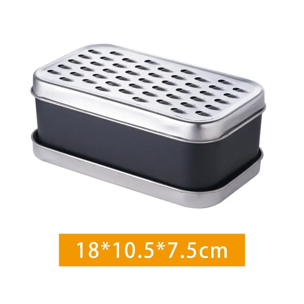 Rectangular stainless steel soap dish with black interior and perforated lid paired with stainless steel cheese grater container lid