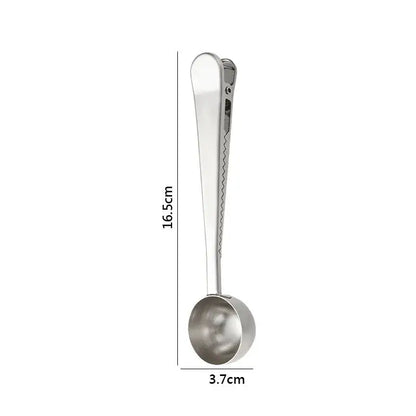 A sleek 16.5cm stainless steel coffee spoon with rounded bowl and sealing clip handle for secure grip in kitchen use