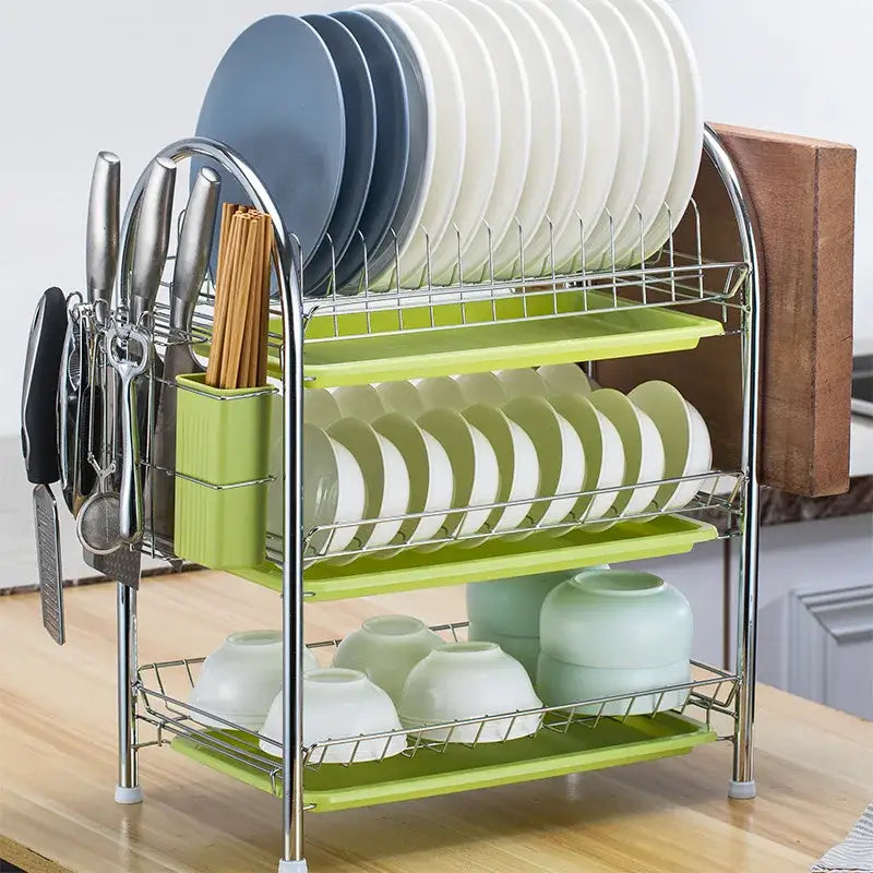 Three-tiered stainless steel kitchen drying rack with lime green trays and side utensil holder organizer shelf