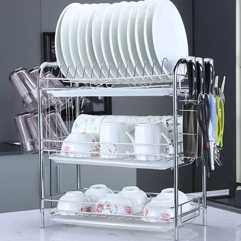 Silver stainless steel curved kitchen drying rack with three-tier white plastic trays and wire mesh dish organizer shelf