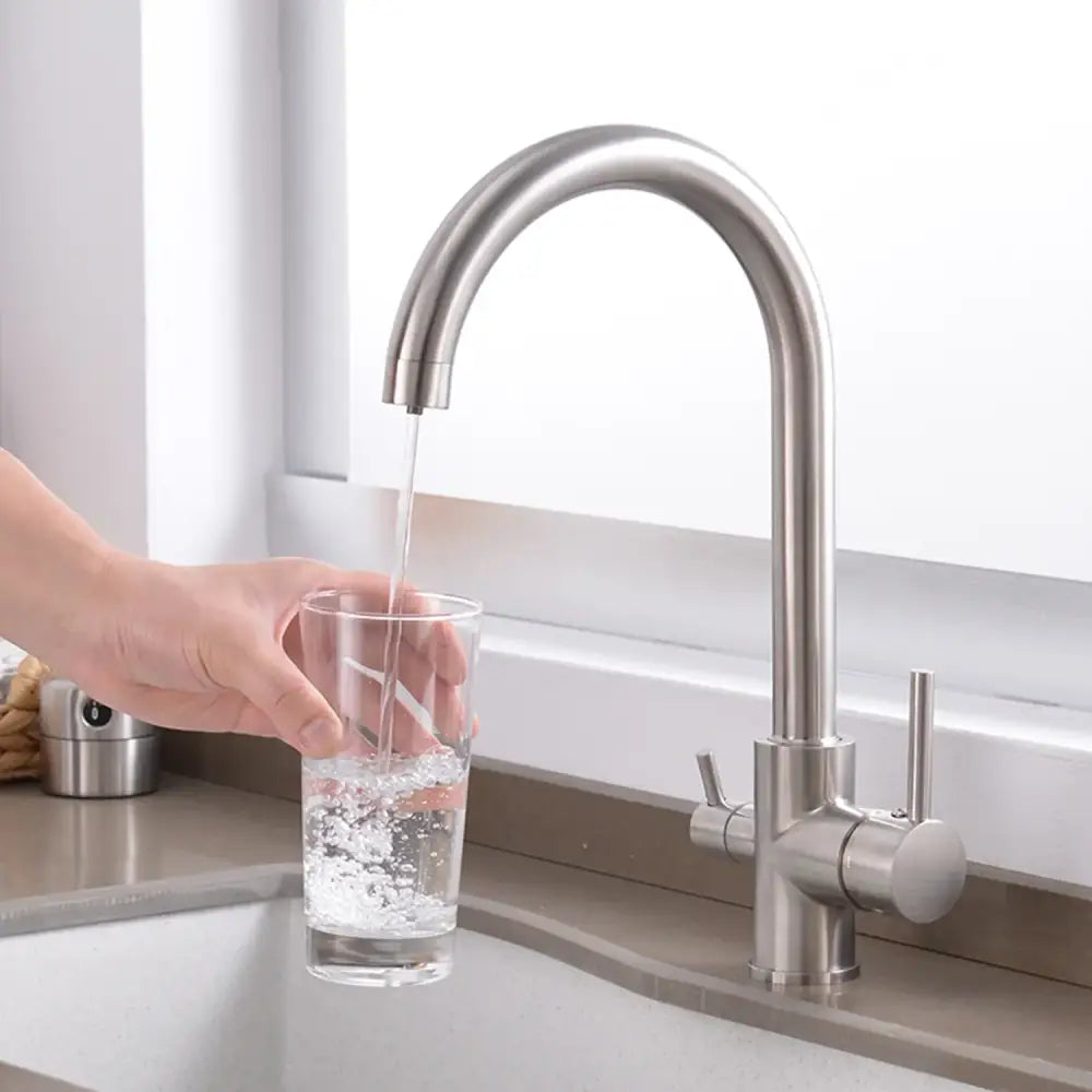 Stainless steel dual handle kitchen faucet with sleek curved spout and 360 rotation high-pressure pull-out sprayer