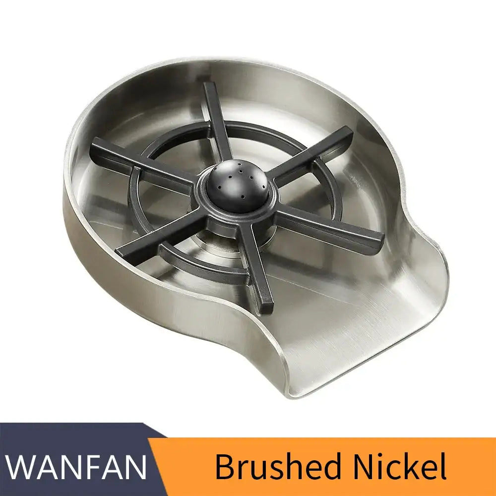 Brushed nickel stainless steel glass rinser with black spiderweb drain and central perforated sphere for kitchen use