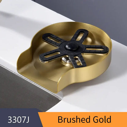 Brushed gold stainless steel glass rinser drain cover with black rubberized star-shaped center for cup washer use