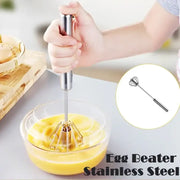 Stainless steel hand pressure egg beater with sleek metallic handle and whisk head for kitchen use
