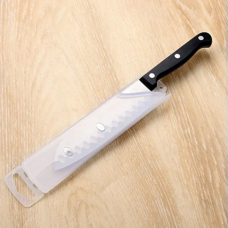 Black-handled stainless steel serrated knife with clear plastic decorbites knife scabbard for kitchen use