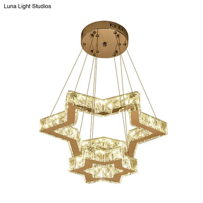 Lámpara de techo LED de acero inoxidable: Lámpara colgante con forma de estrella de cinco puntas y bloques de cristal, disponible en tres colores: cálido, blanco y otros.