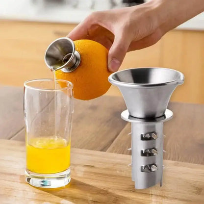 Silver stainless steel lemon squeezer juicer with conical funnel top and segmented reamer base for kitchen use decorbites lemon squeezer