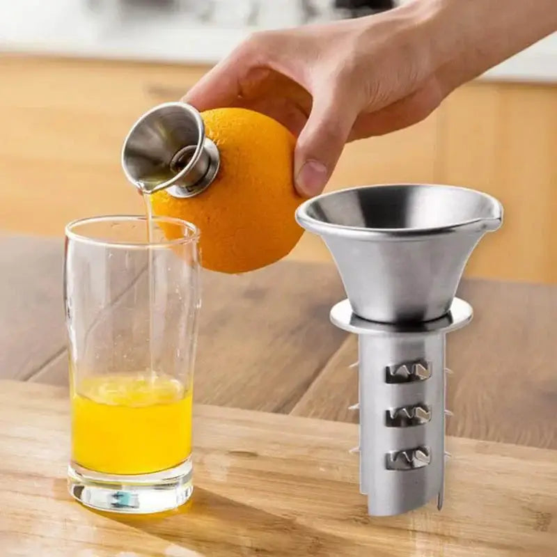 Silver stainless steel lemon squeezer juicer with conical funnel top and segmented reamer base for kitchen use decorbites lemon squeezer