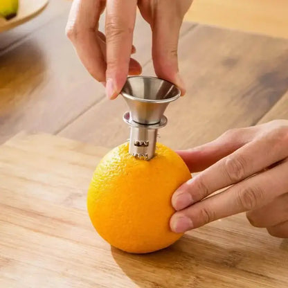 Stainless steel lemon squeezer juicer with conical top and serrated base for easy orange peeling by decorbites lemon squeezer
