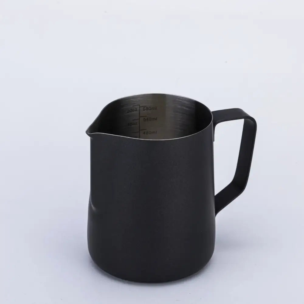 Black matte stainless steel milk frothing jug with interior measurement markings for precise milk frothing