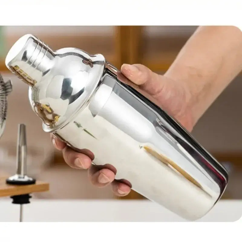 Stainless steel professional bartender kit barman set featuring a shiny cocktail shaker with a sleek reflective finish
