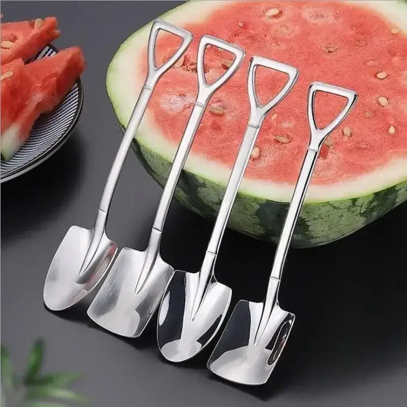 Set of four shiny stainless steel teaspoons with shovel-shaped scoops and ergonomic d-handled grips for dining use