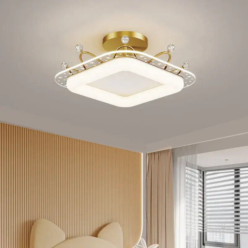 Gold-toned square ceiling light with crystal accents and modern design ideal for decorbites kids room ceiling lighting