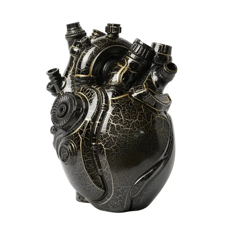 A glossy black steampunk heart cardiac vase with gold crackle detailing and mechanical components for decorbites heart decor
