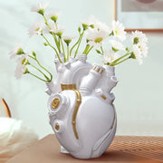 Steampunk white and gold heart cardiac vase with intricate mechanical details for decorbites heart cardiac decor