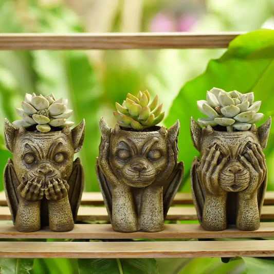 Three stone-like gargoyle resin vase sculptures with succulents for garden decorbites gargoyle resin planter set