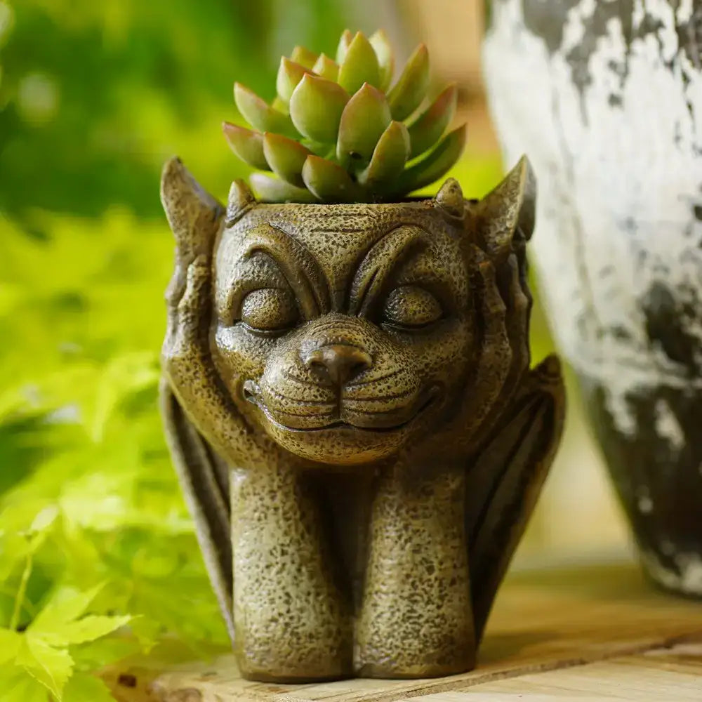 A rustic greenish-brown decorbites gargoyle resin vase sculpture with succulent for garden decor planter set