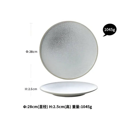 Silver metallic ceramic dinner plate with textured reflective surface and rounded edges from decorbites dinner plate set