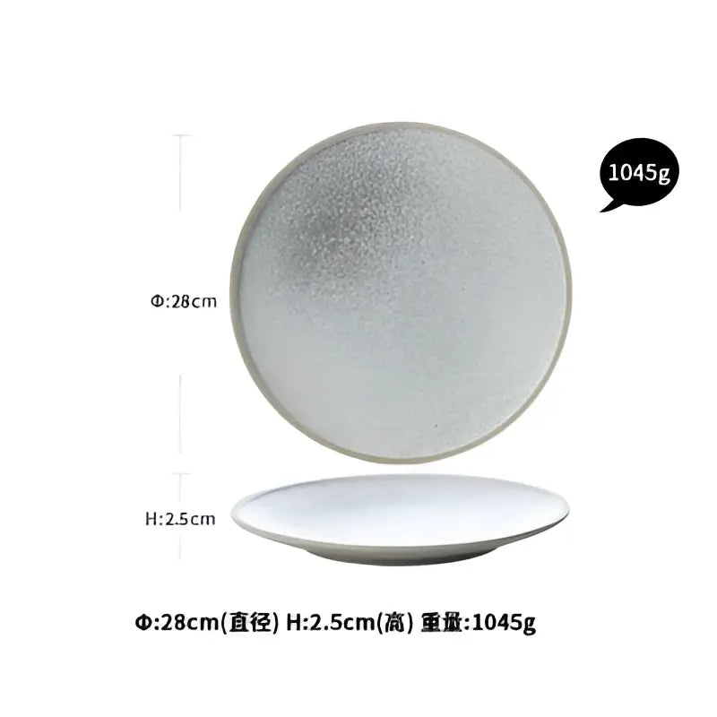 Silver metallic ceramic dinner plate with textured reflective surface and rounded edges from decorbites dinner plate set