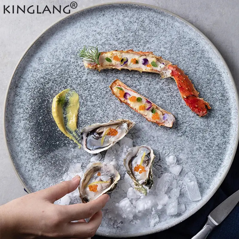 Gray speckled ceramic dinner plate with matte finish and kinglang logo ideal for decorbites ceramic dinner plate set