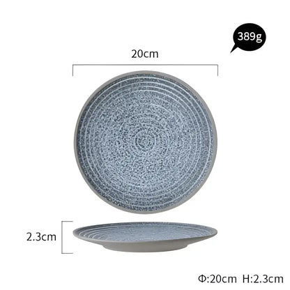 Blue and white stone inspired speckled ceramic dinner plate with concentric patterns from decorbites dinner plate set