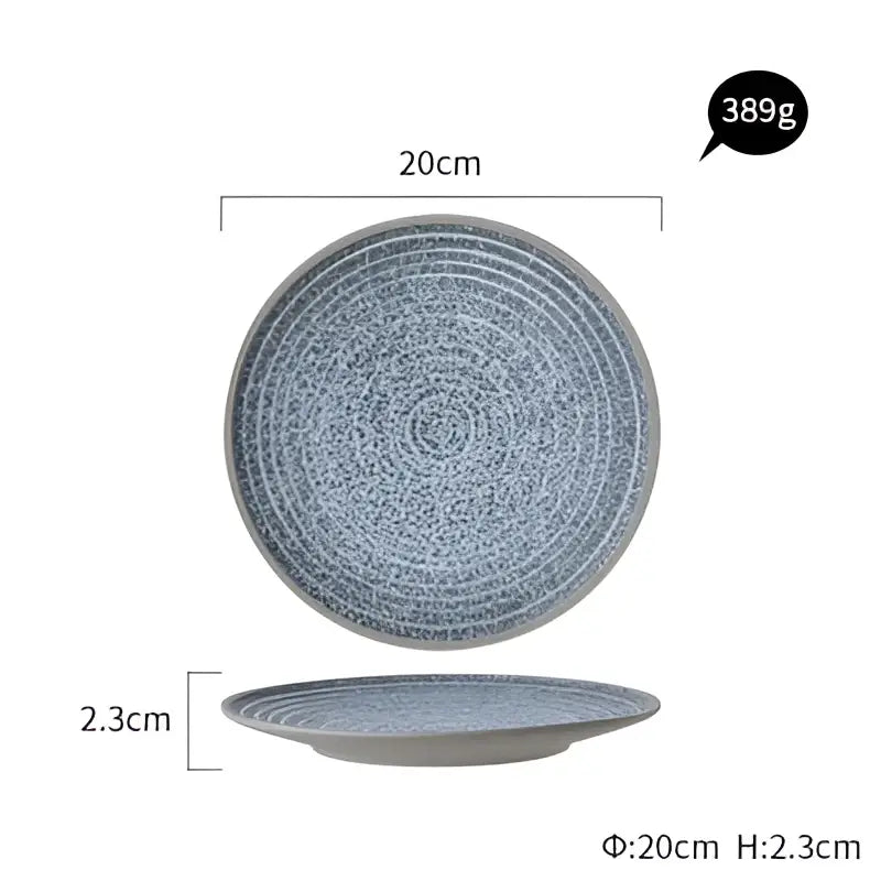 Blue and white stone inspired speckled ceramic dinner plate with concentric patterns from decorbites dinner plate set