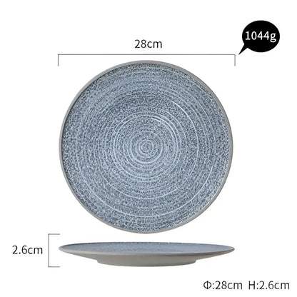 A 28cm gray ceramic dinner plate with textured concentric circles and speckled finish from decorbites dinner plate set