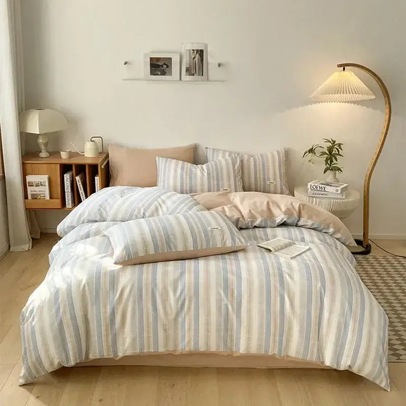 A cozy bedding set with blue and beige pastel stripes featuring a cotton fitted sheet for bedroom decorbites grid printed style