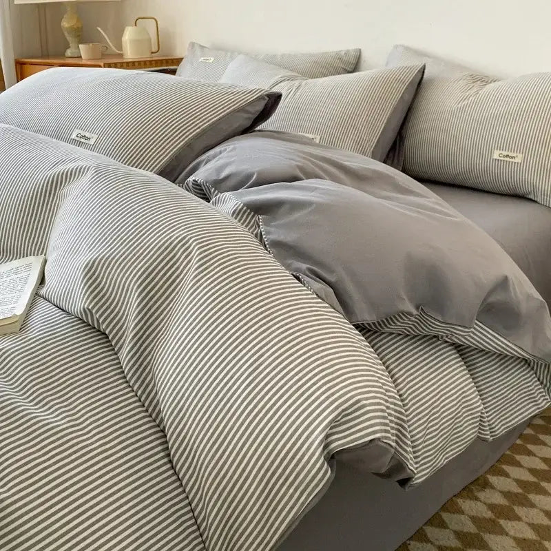 Gray and white striped cotton duvet cover set with modern design paired with striped beige and blue fitted sheet decorbites grid printed bedding set