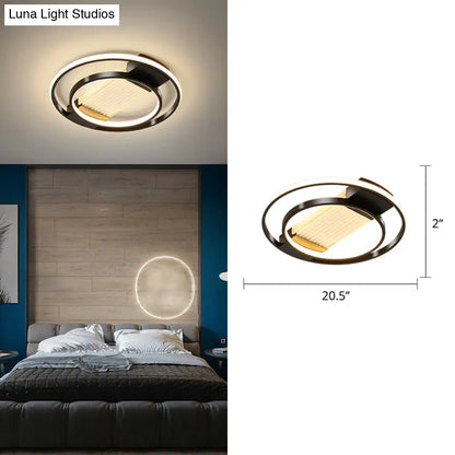 DecorBites™ DecorBites™ Stylish Bedroom Glow: Black Metallic LED Flush Mount Ceiling Light with a Simple Halo Design