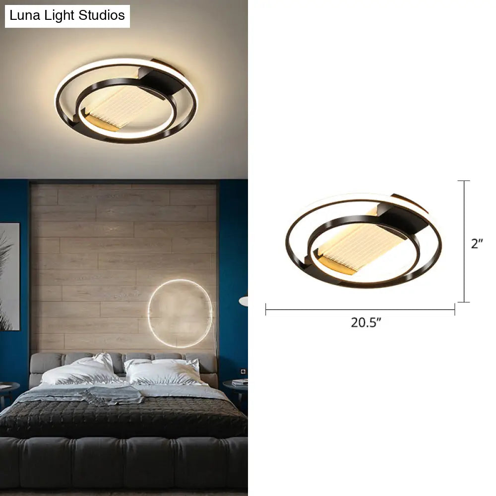 DecorBites™ DecorBites™ Stylish Bedroom Glow: Black Metallic LED Flush Mount Ceiling Light with a Simple Halo Design