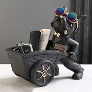 Stylish black suit dog statue storage box featuring a figurine with iridescent sunglasses pushing a wooden cart decorbites dog statue