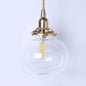 Stylish Oval Pendant Light in Brass with Glass Shade - Perfect for Cloth Shop