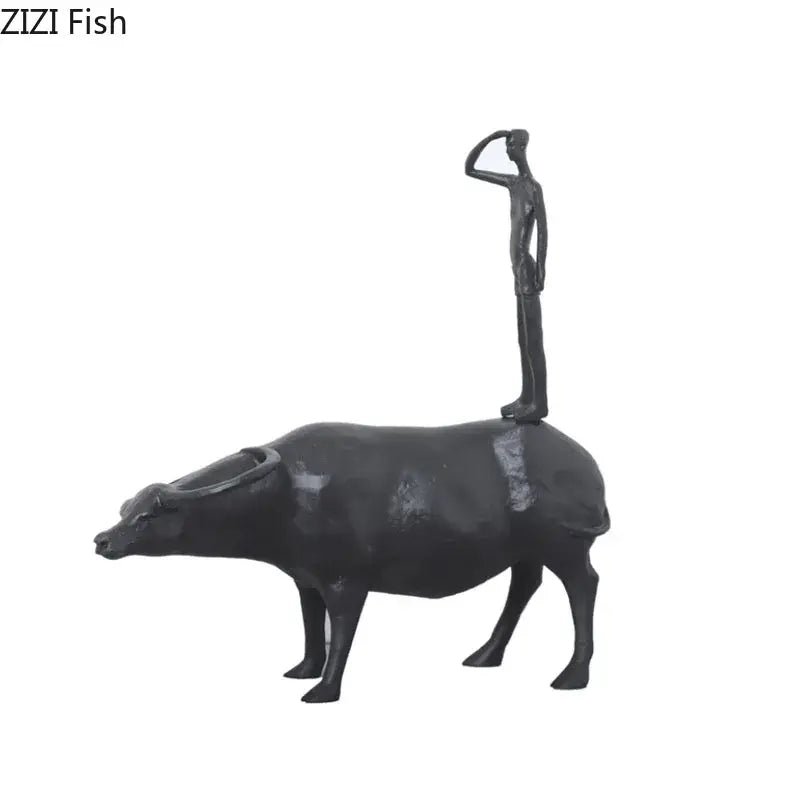 Stylized black matte metal cowherd shepherd boy sculpture saluting atop buffalo for living room decorbites decor
