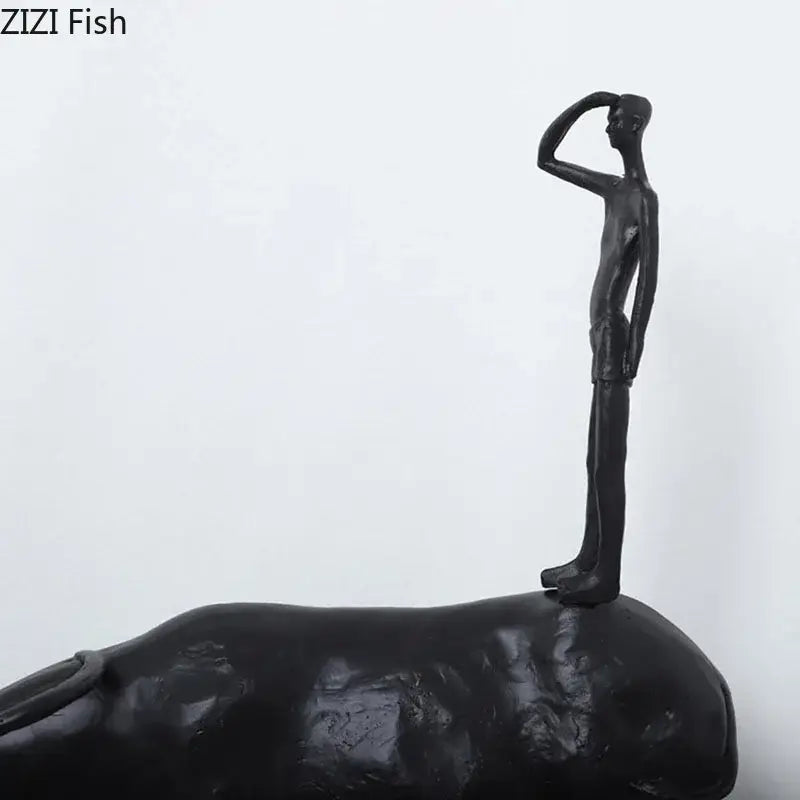 Stylized black matte metal cowherd shepherd boy sculpture with slender humanoid figure for living room decorbites decor