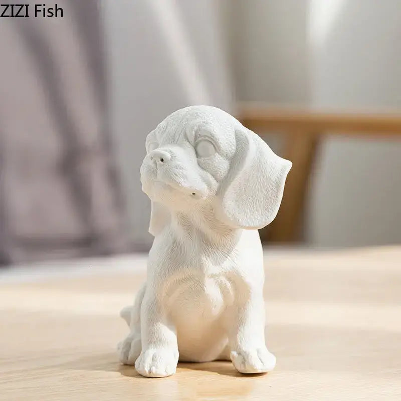 Stylized white matte ceramic sculpture of a sitting beagle puppy as a miniature figurine for living room decor