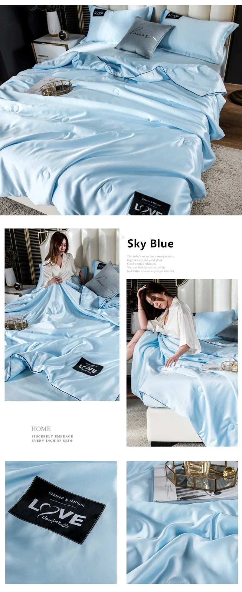 Sky blue satin summer mulberry silk comforter with subtle sheen and black embroidered love brand label on duvet cover