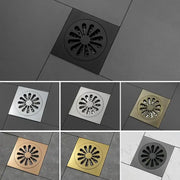 Sunburst brass square shower floor drain with radiating slots in brushed stainless steel polished chrome and gold tones