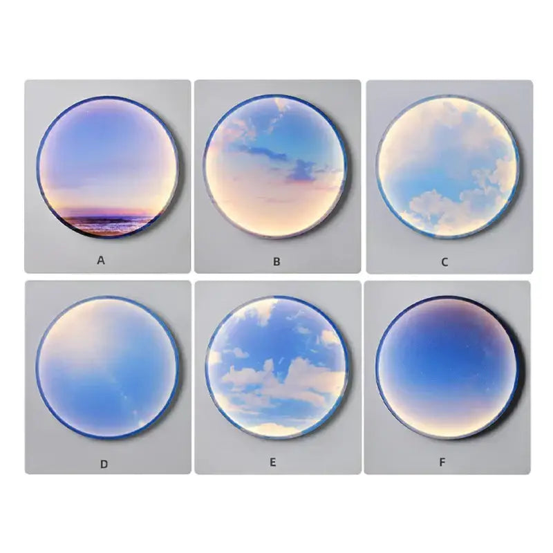 Circular glass lens wall lamp with printed sky blue sunset ocean scene featuring soft blue and purple gradients for bedroom